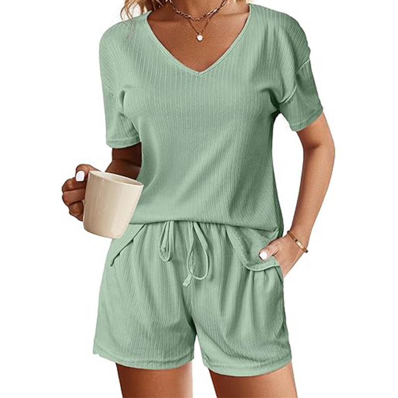 V-Neck short sleeve shirt with matching drawstring shorts set in green.
