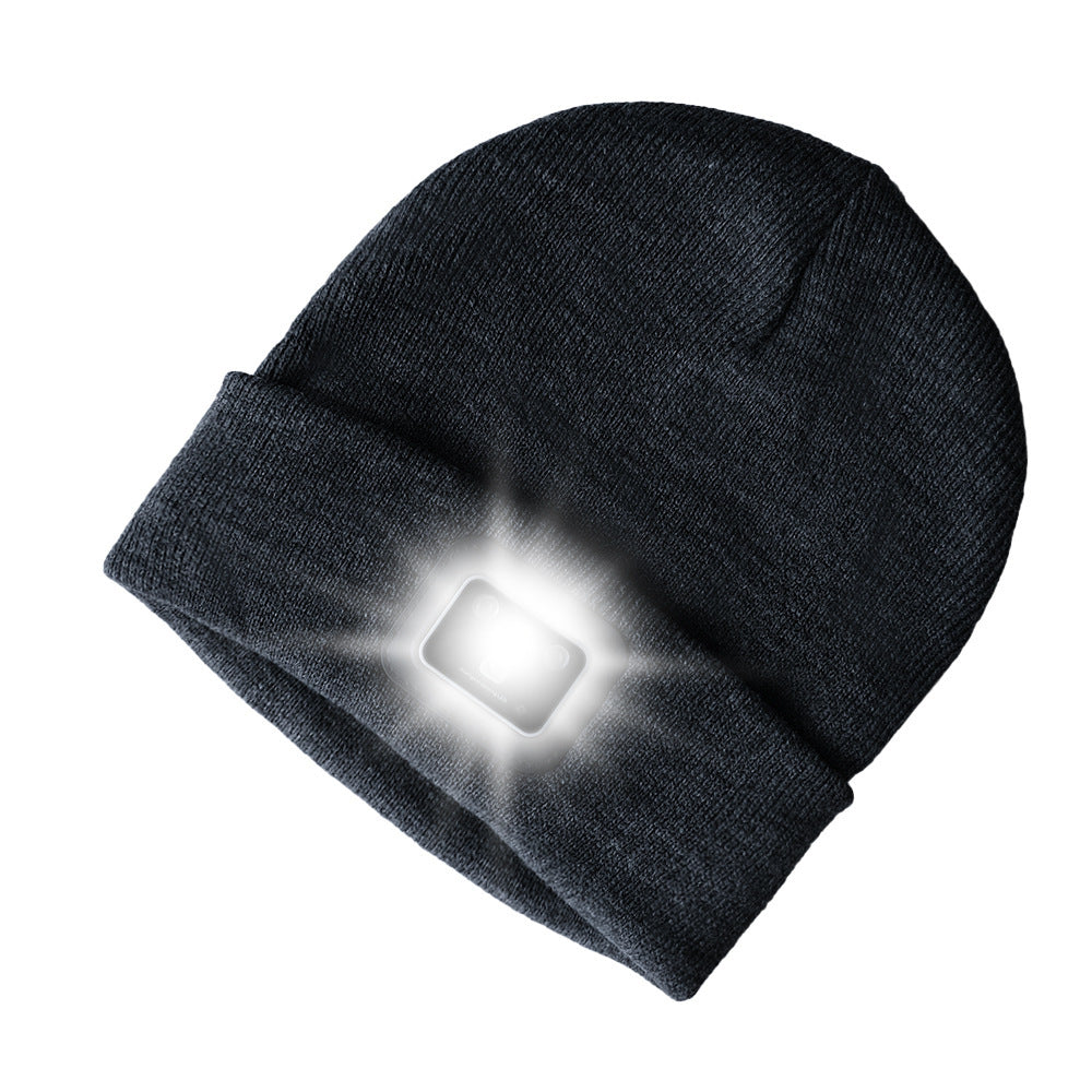 Knit toque with built-in light in classic black, ideal for winter nighttime activities.