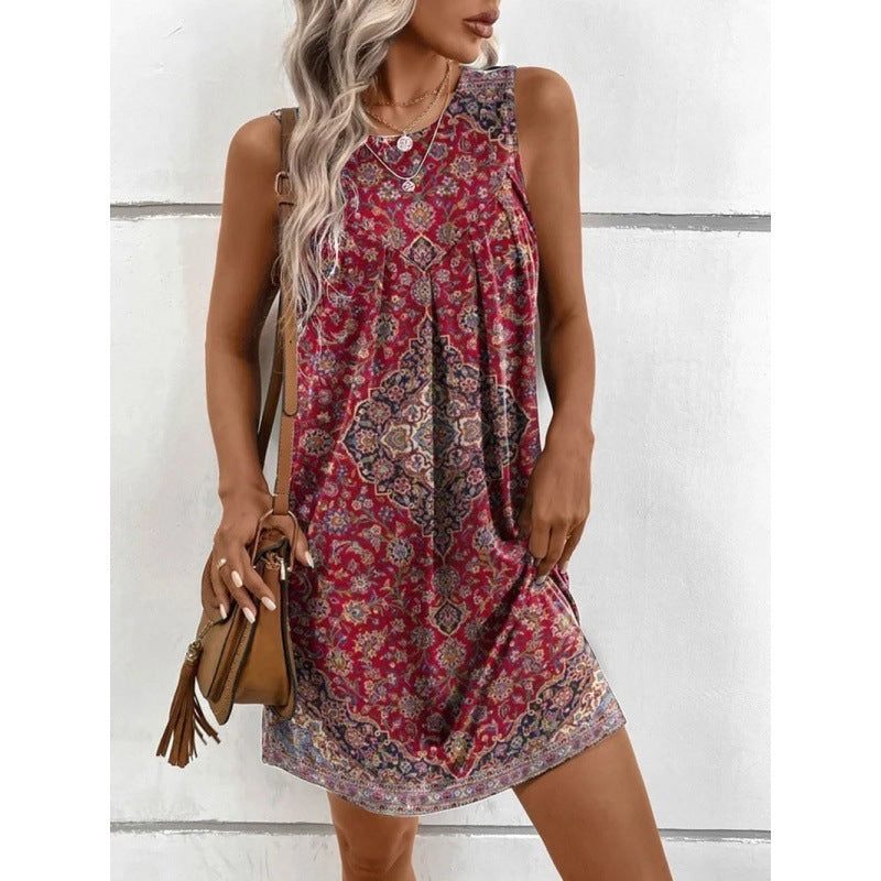 Women's sleeveless summer dress with boho floral print in red, blue, and purple.