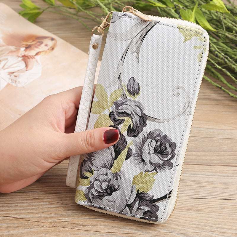 Women's Multi-Compartment Zippered Floral Wallet