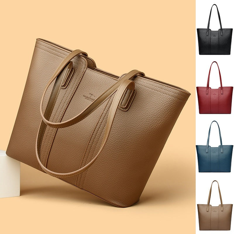 Women's shoulder bag in genuine leather with multiple color options, featuring a stylish high-capacity design.