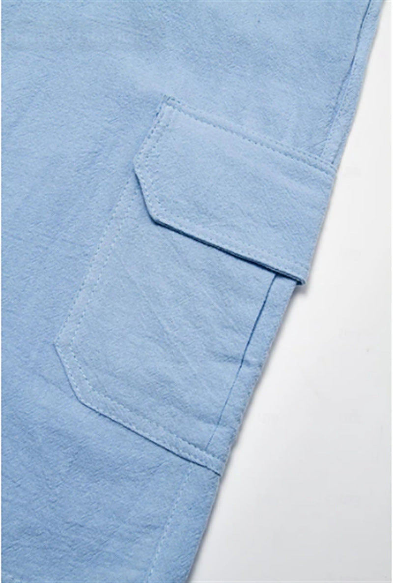 Light blue Bermuda shorts with a pocket detail.