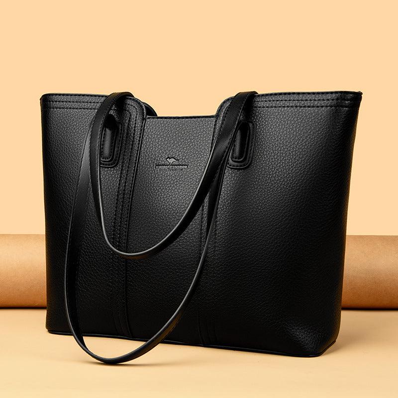 Women's shoulder bag in genuine leather with multiple color options, featuring a stylish high-capacity design.