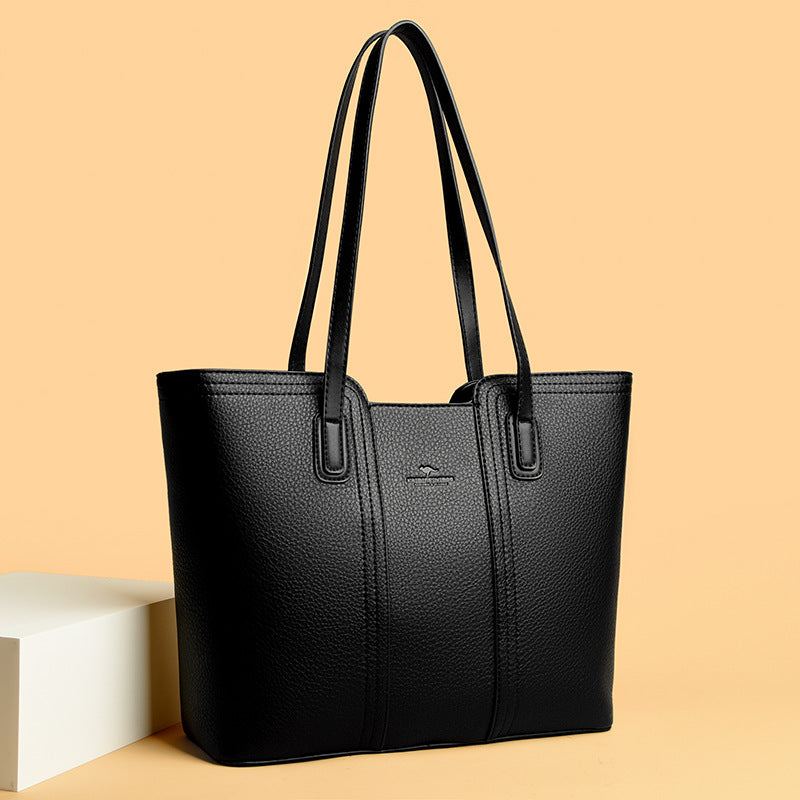 Women's shoulder bag in genuine leather with multiple color options, featuring a stylish high-capacity design.