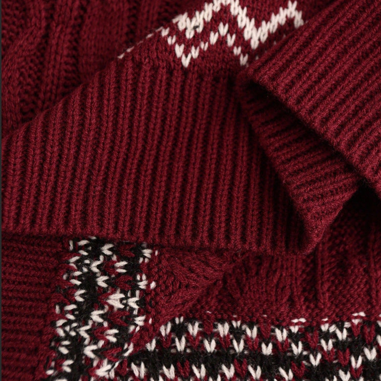 Close-up of red Christmas Retro Round-neck cable knit sweater with white and black pattern detail
