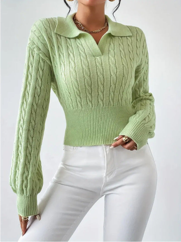 Solid colour light green V-neck cropped sweater with lapel and long sleeves.