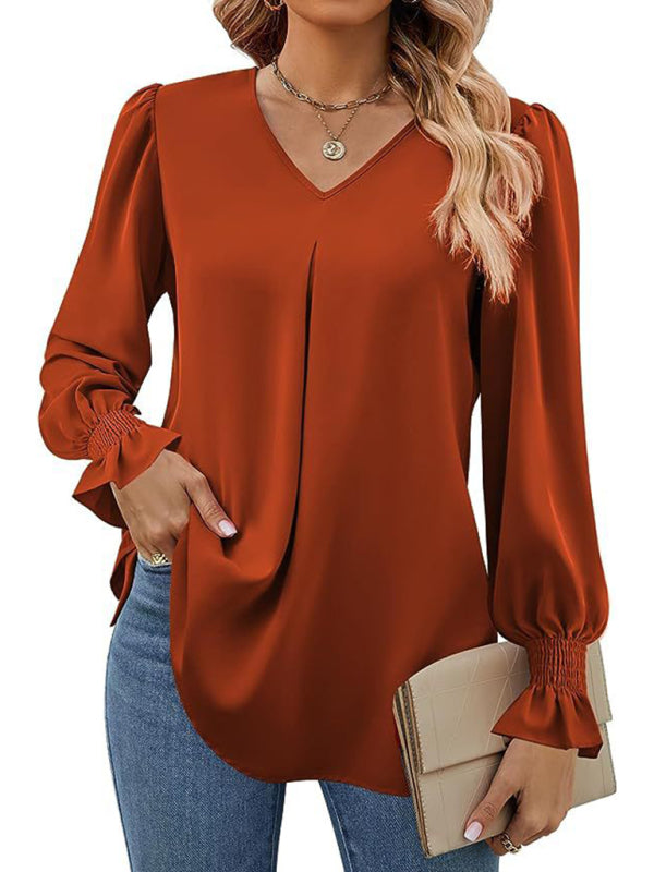 Elegant long sleeve V-neck pleated chiffon blouse in rust color.