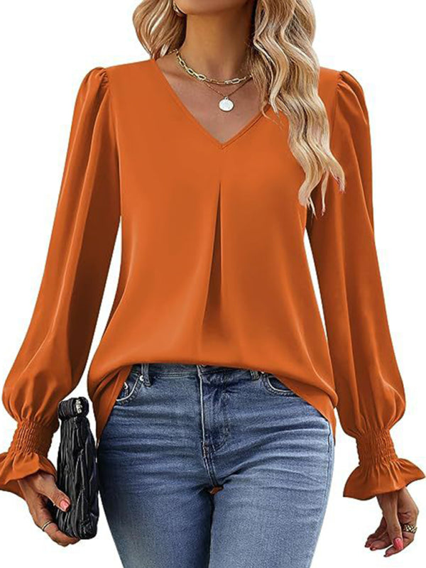 Elegant long sleeve V-neck pleated chiffon blouse in orange.