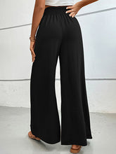 Load image into Gallery viewer, Women’s Solid Wide Leg Flared Pants with Elastic Waist and Pockets in 3 Colors S-XL